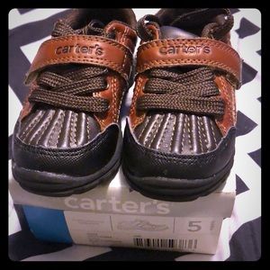 Toddler shoes by Carter’s. Lightly worn.